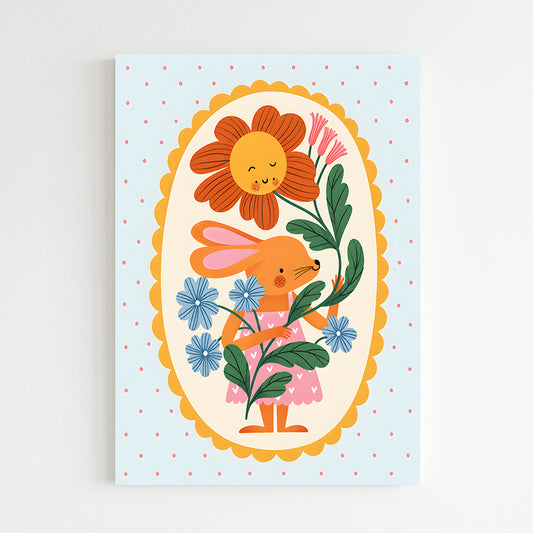 Lapin joyeux avec bouquet coloré